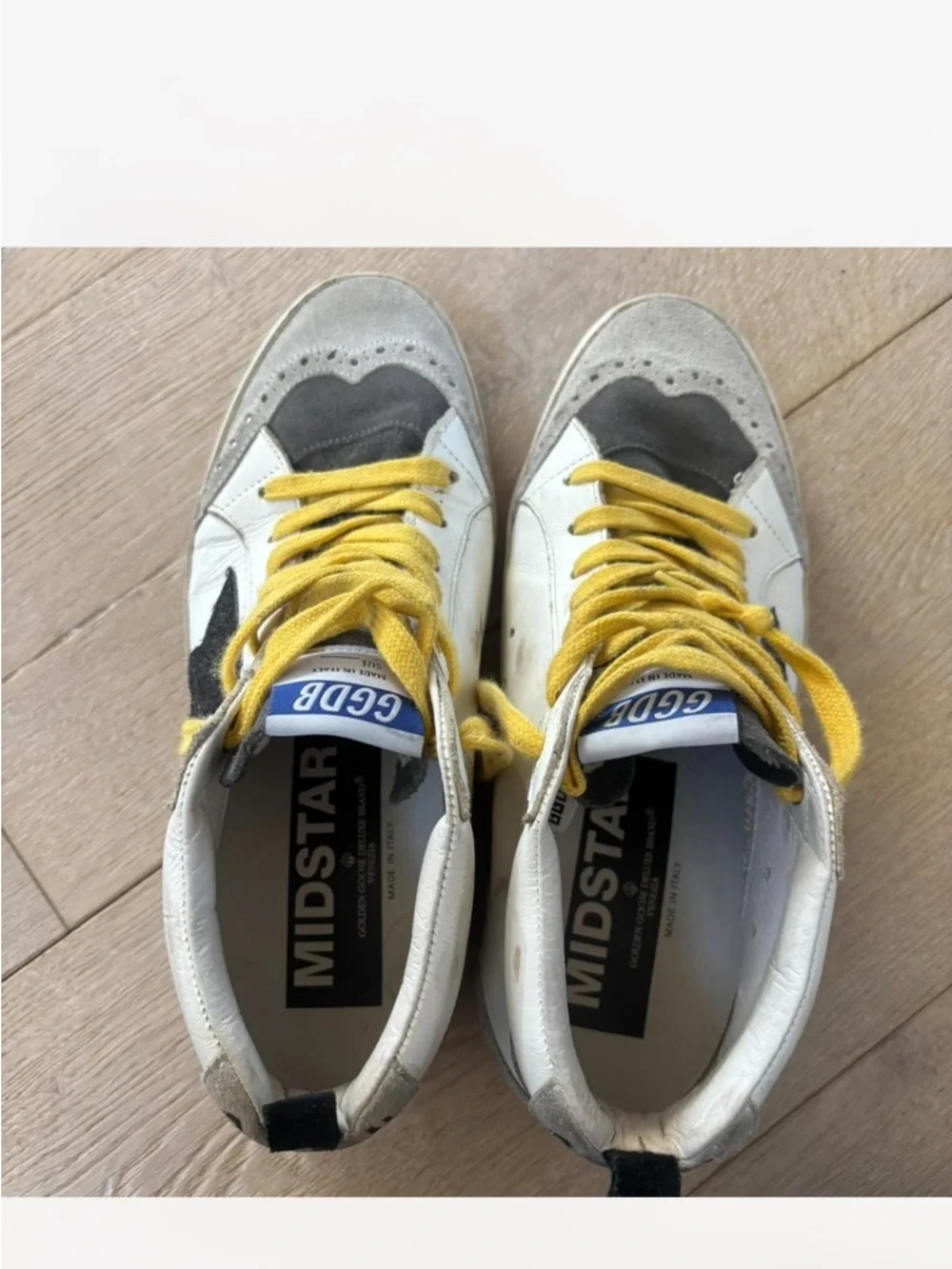 Golden Goose White Leather Mid-Top Sneakers with Black Star and Yellow Laces - Picture 3 of 6